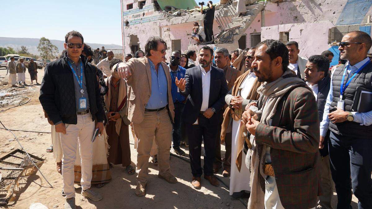 United Nations Resident and Humanitarian Coordinator for Yemen David Gressly, pictured in blue shirt and tan suit, was on the job in 2022.