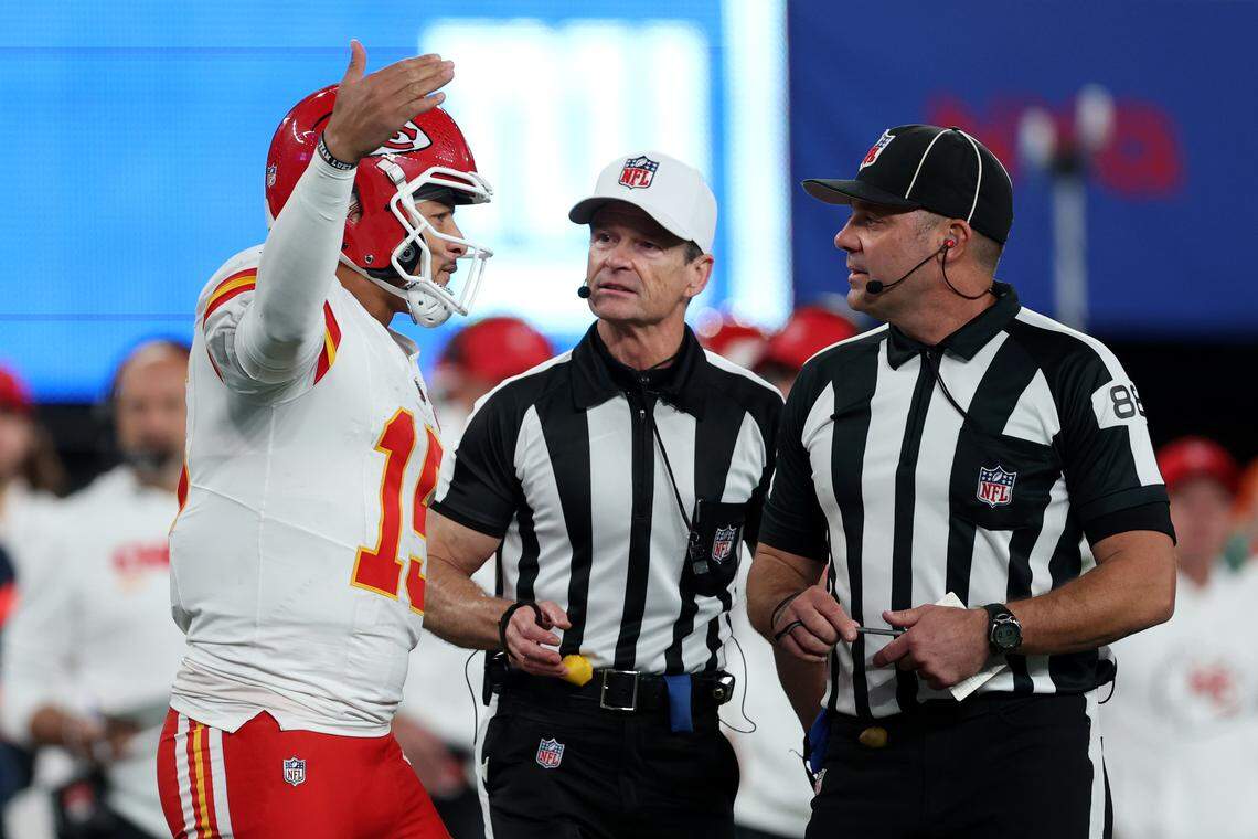Kansas City Chiefs quarterback Patrick Mahomes, left, pleads his case to the officials during an NFL Week 3 game against the New York Giants at MetLife Stadium in East Rutherford, New Jersey, on Sunday, Sept. 21, 2025.