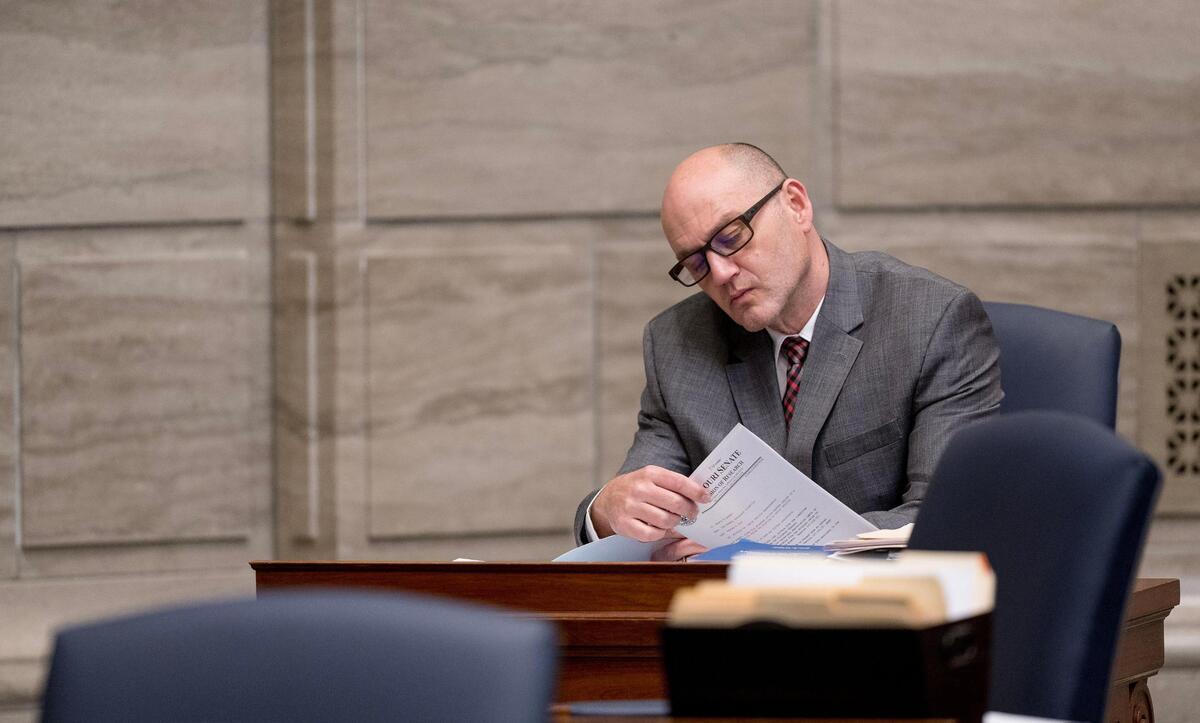 Then-Sen. Denny Hoskins, a Warrensburg Republican, reads a proposed bill during session on Wednesday, Feb. 21, 2024, in Jefferson City. Hoskins is now Missouri’s secretary of state.
