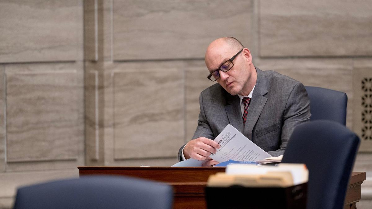 Sen. Denny Hoskins, a Warrensburg Republican running for secretary of state, reads a proposed bill during session on Wednesday, Feb. 21, 2024, in Jefferson City.