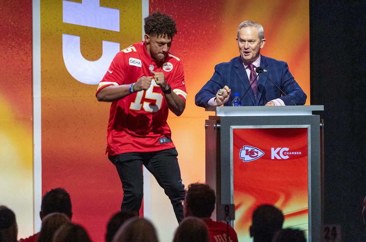 Chiefs quarterback Patrick Mahomes jokes around with Mitch Holthus as he was introduced to the crowd at the 2024 Chiefs Kickoff Luncheon.