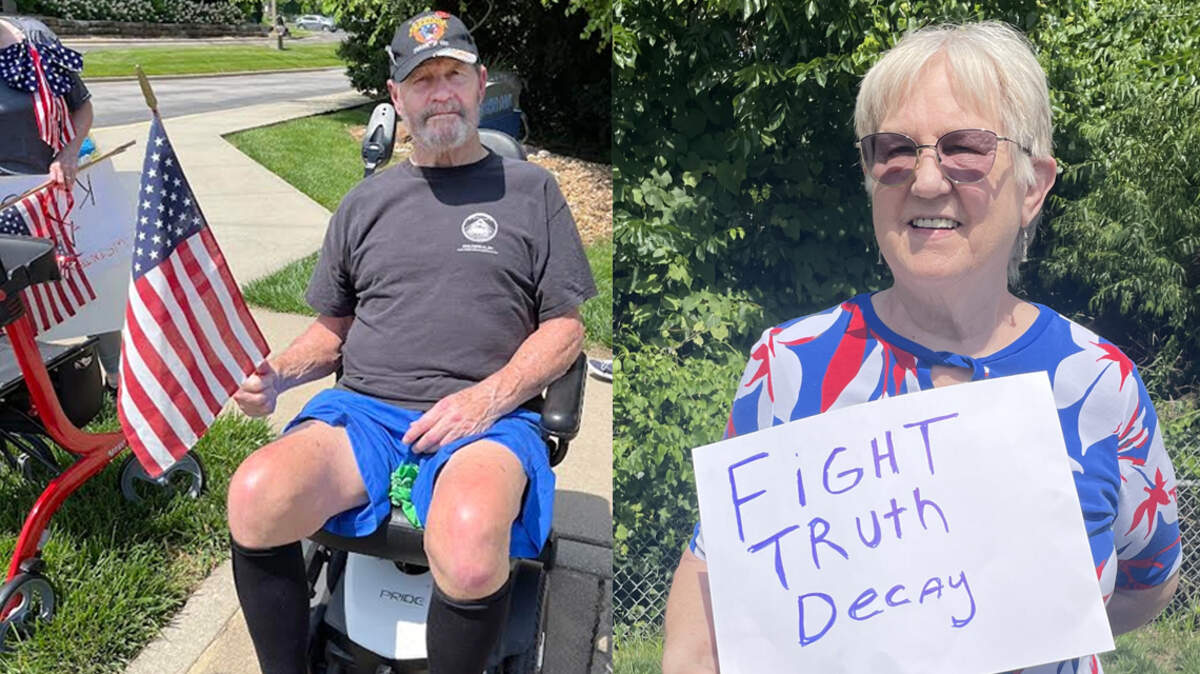Mike Davies, left, at a No Kings protest in Overland Park on June 14, 2025