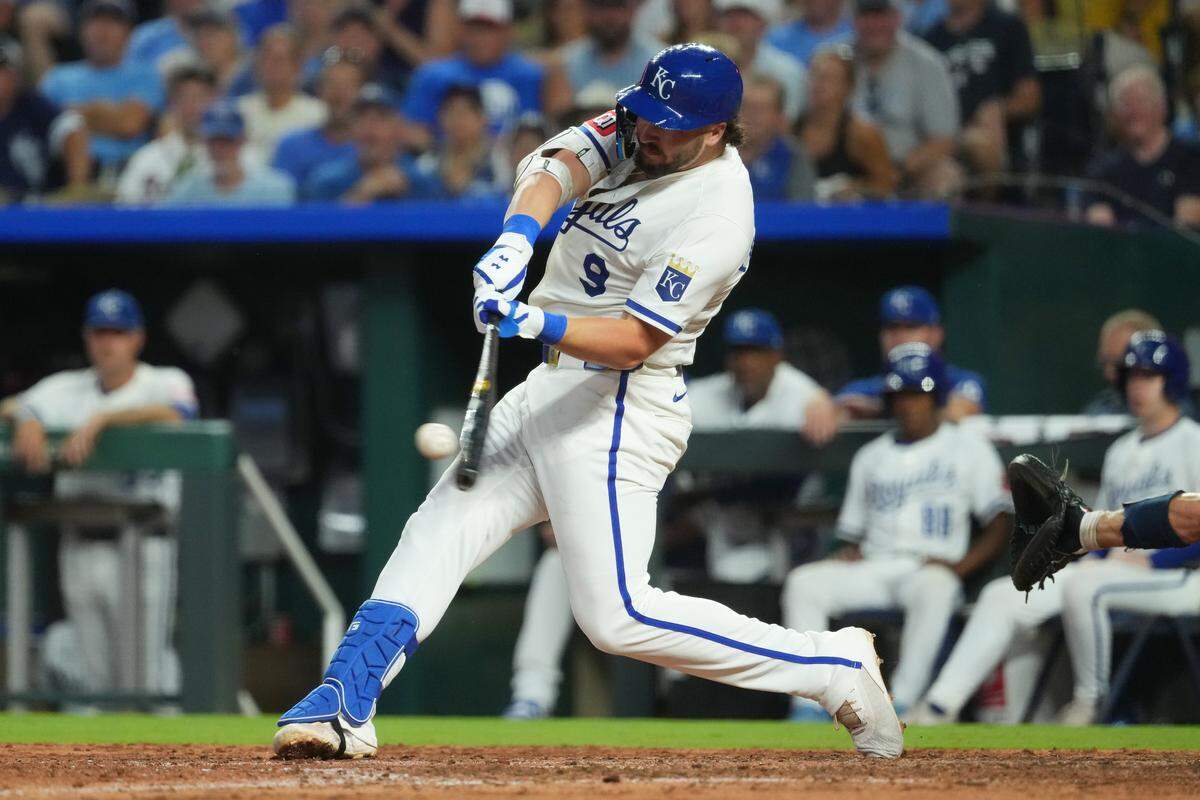 Vinnie Pasquantino #9 of the Kansas City Royals hits an RBI ground-rule double in the sixth inning against the Atlanta Braves at Kauffman Stadium on July 29, 2025 in Kansas City, Missouri.