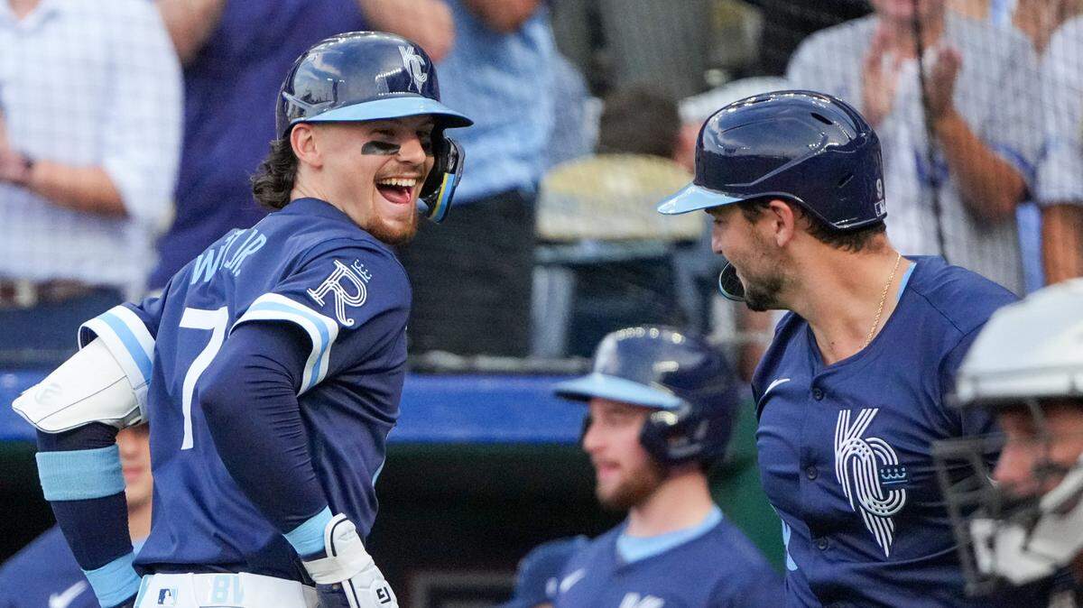 Kansas City Royals shortstop Bobby Witt Jr. (7) celebrates with first baseman Vinnie Pasquantino (9) after hitting a solo home run in the first inning at Kauffman Stadium on July 19, 2024.