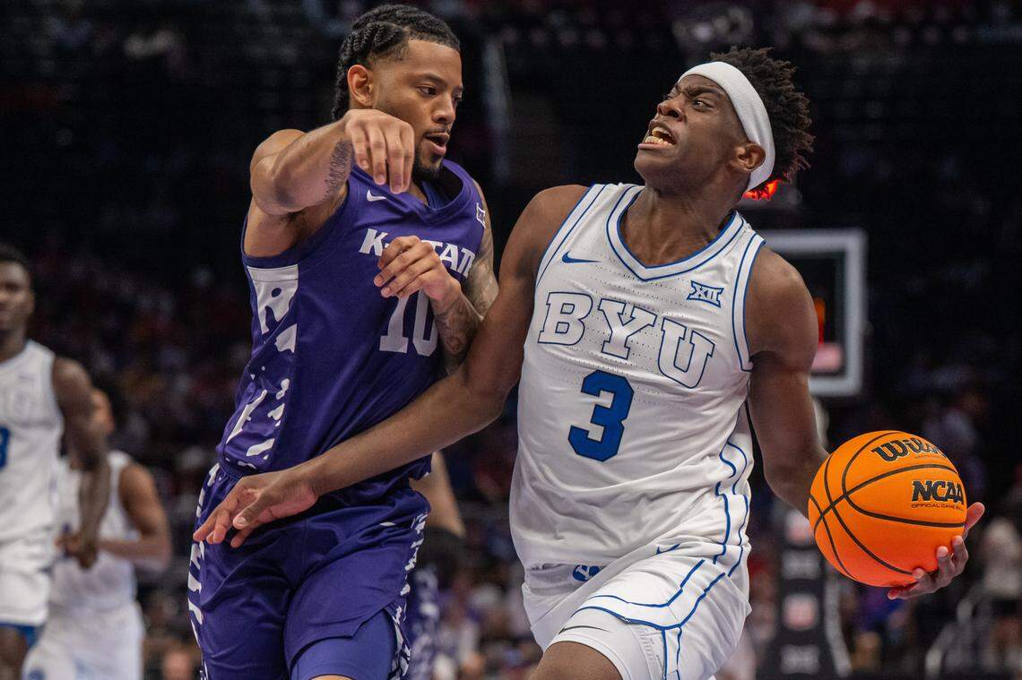 BYU Cougars forward AJ Dybantsa drives to the lane against Kansas State Wildcats guard David Castillo (10) in the second half of the Wildcats first round game vs. the BYU Cougars in the Big 12 Men's Basketball Tournament, on Tuesday, March 10, 2026, at T-Mobile Center. The Wildcats lost to BYU, 105-91.
