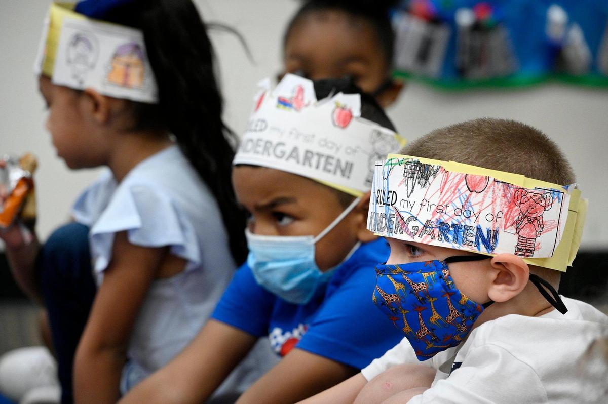 Frank Goin, right, Daniel Avila and other kindergartners on the first day of school at Hazel Grove Elementary School in Kansas City, Kansas.