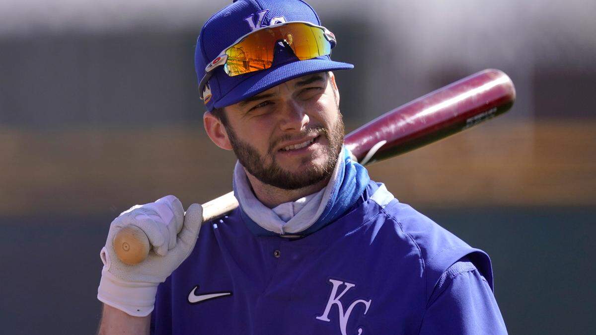 Kansas City Royals’ Andrew Benintendi waits to bat during baseball spring training Wednesday, Feb. 24, 2021, in Surprise, Ariz. (AP Photo/Charlie Riedel)