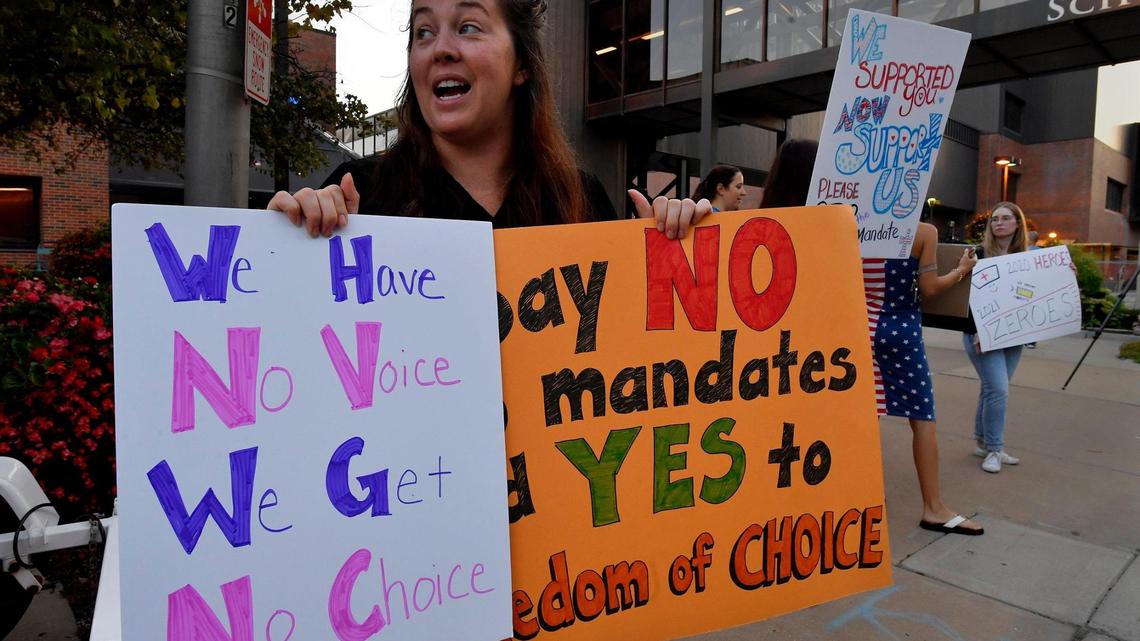 Protest at KU Health System opposes decision to require COVID vaccines for employees