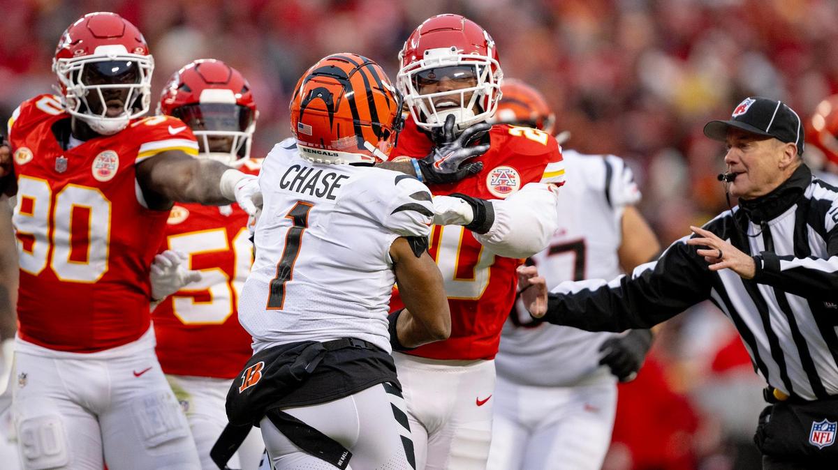 Cincinnati Bengals wide receiver Ja’Marr Chase (1) shoves Kansas City Chiefs safety Justin Reid (20) during an NFL football game at GEHA Field at Arrowhead Stadium on Sunday, Dec. 31, 2023, in Kansas City.