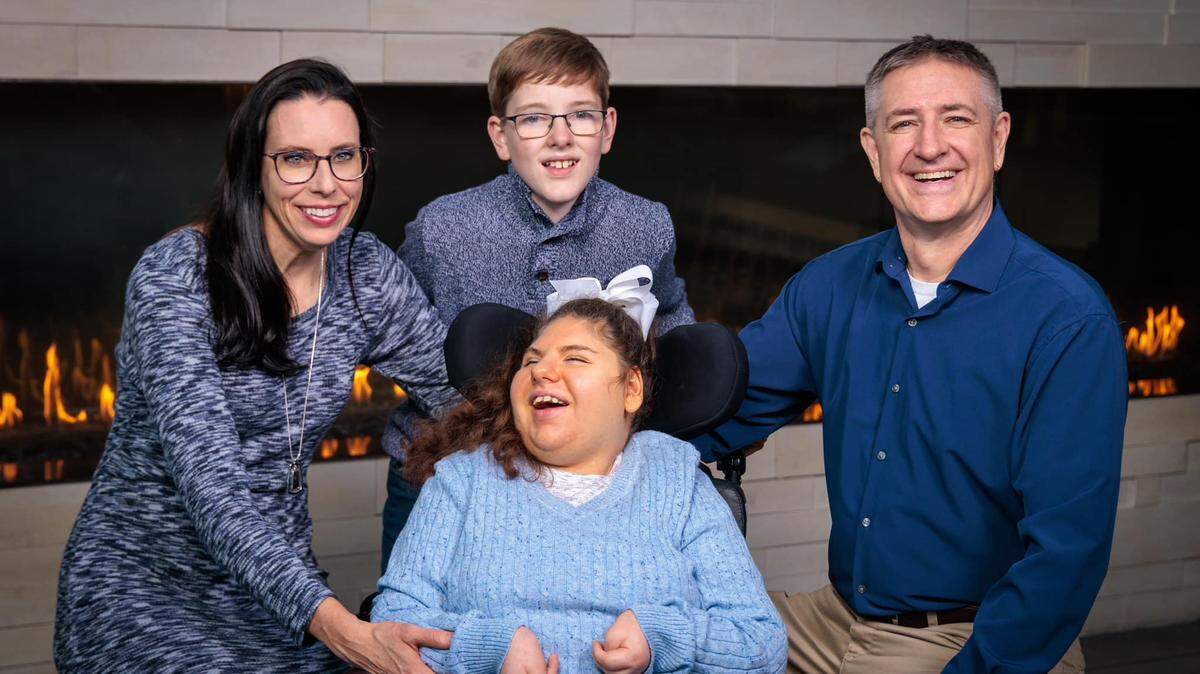 Kacy Seitz, left, and her family. Seitz, a financial planner focused on special needs planning, has heard from clients across the country concerned about possible cuts to Medicaid.