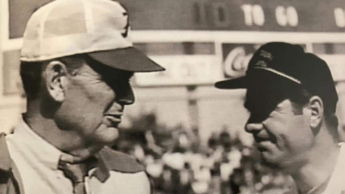 Paul “Bear” Bryant, left, led his Alabama Crimson Tide against the Missouri Tigers, coached by Dan Devine, right, for the first time in the 1968 Gator Bowl.