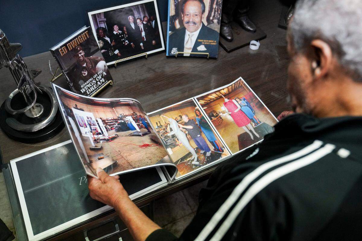 In his Denver studio, Dwight thumbed through a book of photos showcasing a behind the scenes look at the creation of some of his proudest work: “The Inauguration of History and Hope,” sculptures based on the inauguration of President Barack Obama.