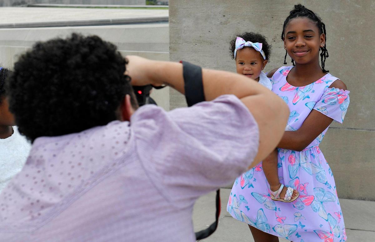 Photographer Alea Lovely makes a portrait during the 6th Annual KC Curly Photoshoot.