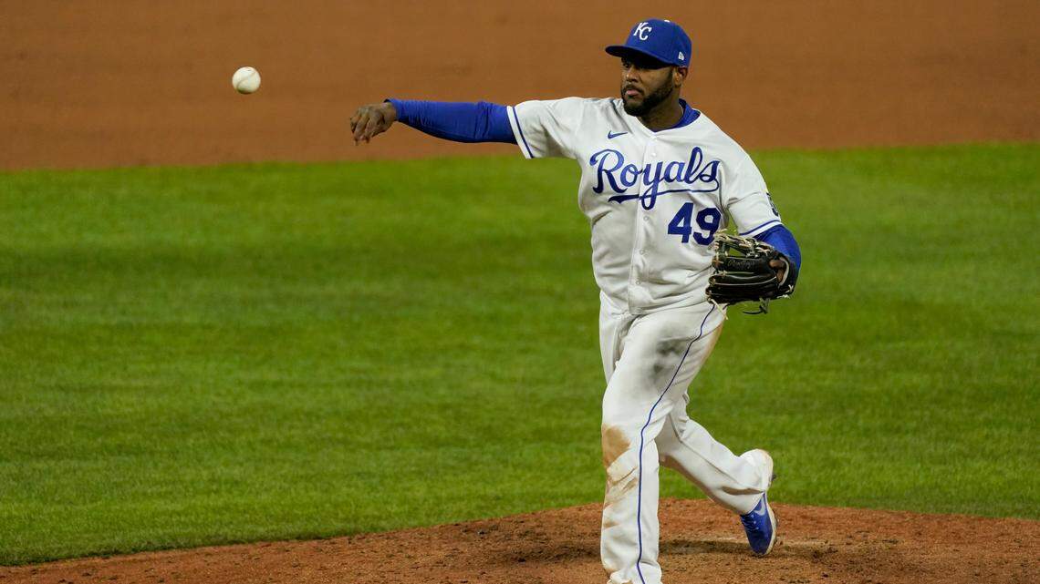 Kansas City Royals third baseman Hanser Alberto pitches during the ninth inning of the team’s baseball game against the Tampa Bay Rays Tuesday, April 20, 2021, in Kansas City, Mo. The Rays won 14-7. (AP Photo/Charlie Riedel)