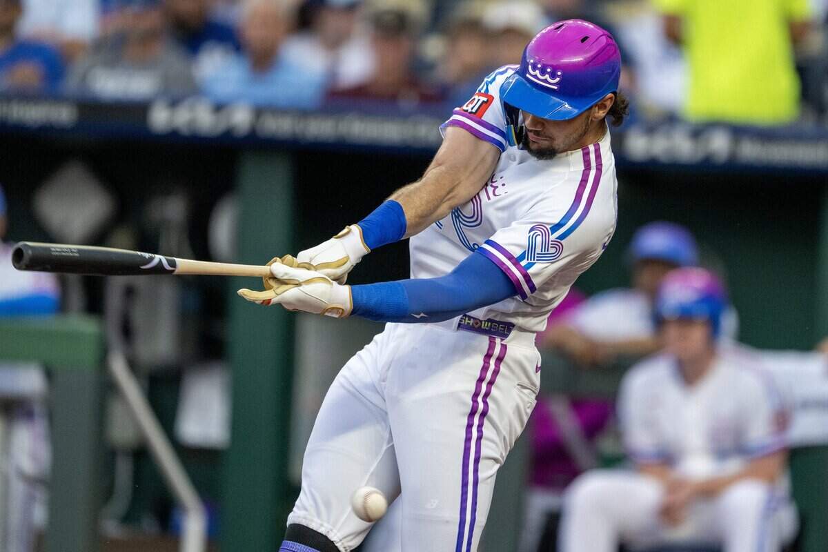 Wearing the Kansas City Royals' new "Forever Fountains" City Connect uniform, right fielder Jac Caglianone (14) hits a foul ball in the first inning against the Houston Astros on Friday, June 12, 2026, at Kauffman Stadium in Kansas City.