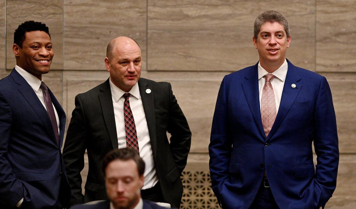 Sen. Bill Eigel, R-Weldon Springs, from right, Sen. Denny Hoskins, R-Warrensburg, and Sen. Brian Williams, D-University City, chat during the afternoon session as Missouri senators convene at the state capitol in Jefferson City Wednesday, Feb. 23, 2022.