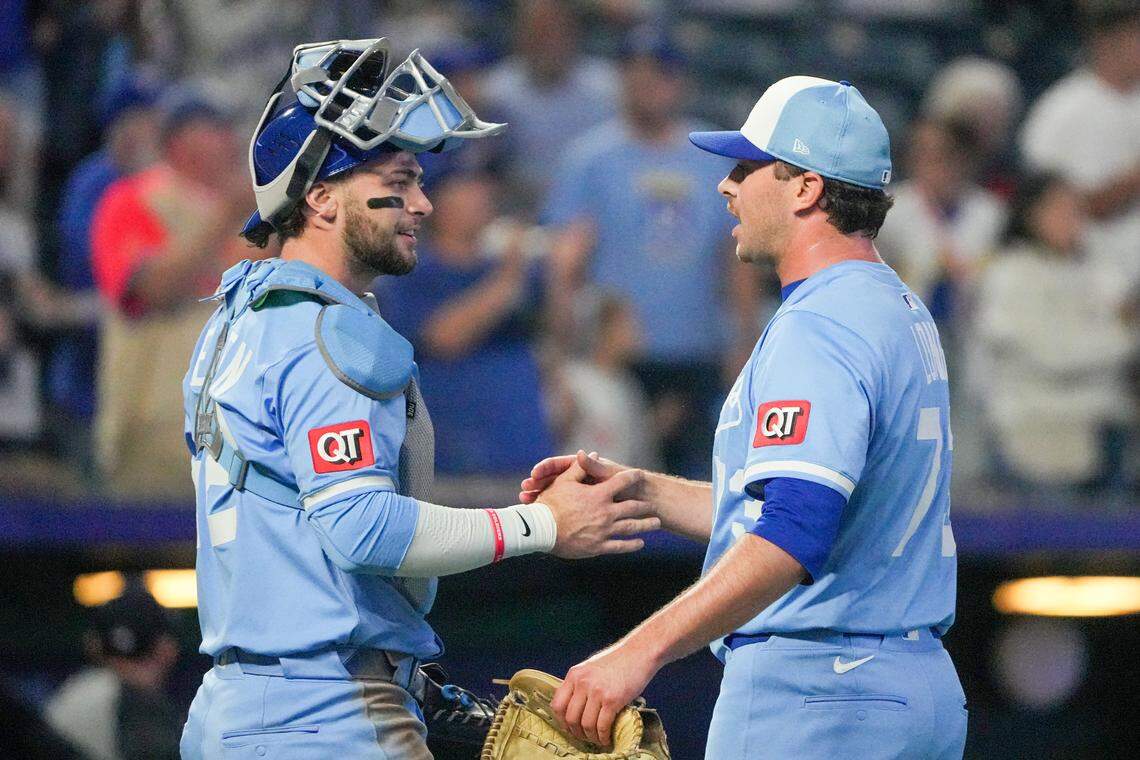 Kansas City Royals designated hitter Carter Jensen (22) celebrates with relief pitcher Sam Long (73) after the win over the Minnesota Twins at Kauffman Stadium on Sep 6, 2025 in Kansas City.