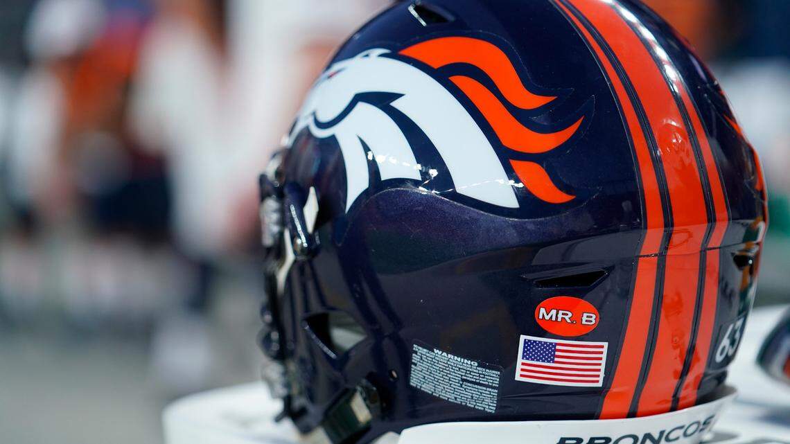 A “Mr. B” sticker honoring the passing of former owner Pat Bowlen adorns the helmets of the Denver Broncos during an NFL preseason football game between the Denver Broncos and the San Francisco 49ers, Monday, Aug. 19, 2019, in Denver. (AP Photo/Jack Dempsey)