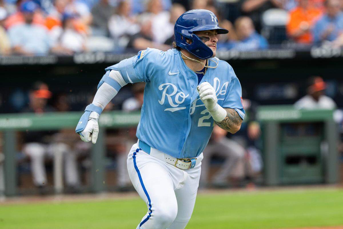 Kansas City Royals catcher Carter Jensen (22) runs toward first base after a hit vs. the Baltimore Orioles on Wednesday, April 22, 2026 at Kauffman Stadium.
