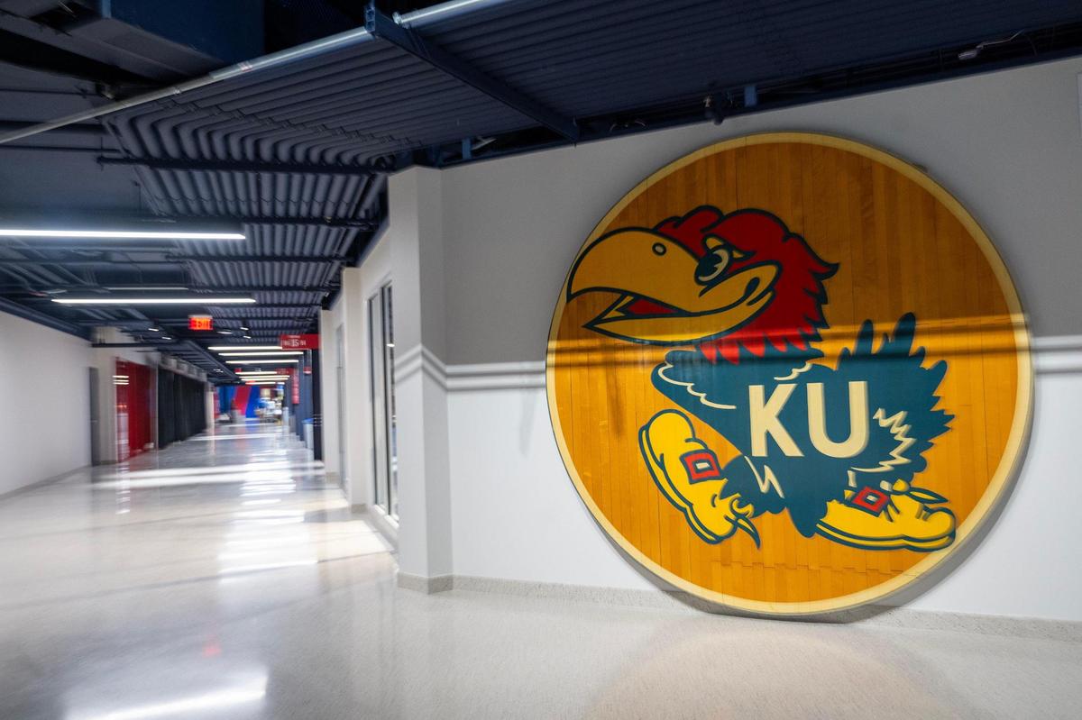 An original piece of the Allen Fieldhouse court from 1979-92 hangs on display in the newly renovated second-level concourse at Allen Fieldhouse in Lawrence. Renovations to the fieldhouse are nearly complete.