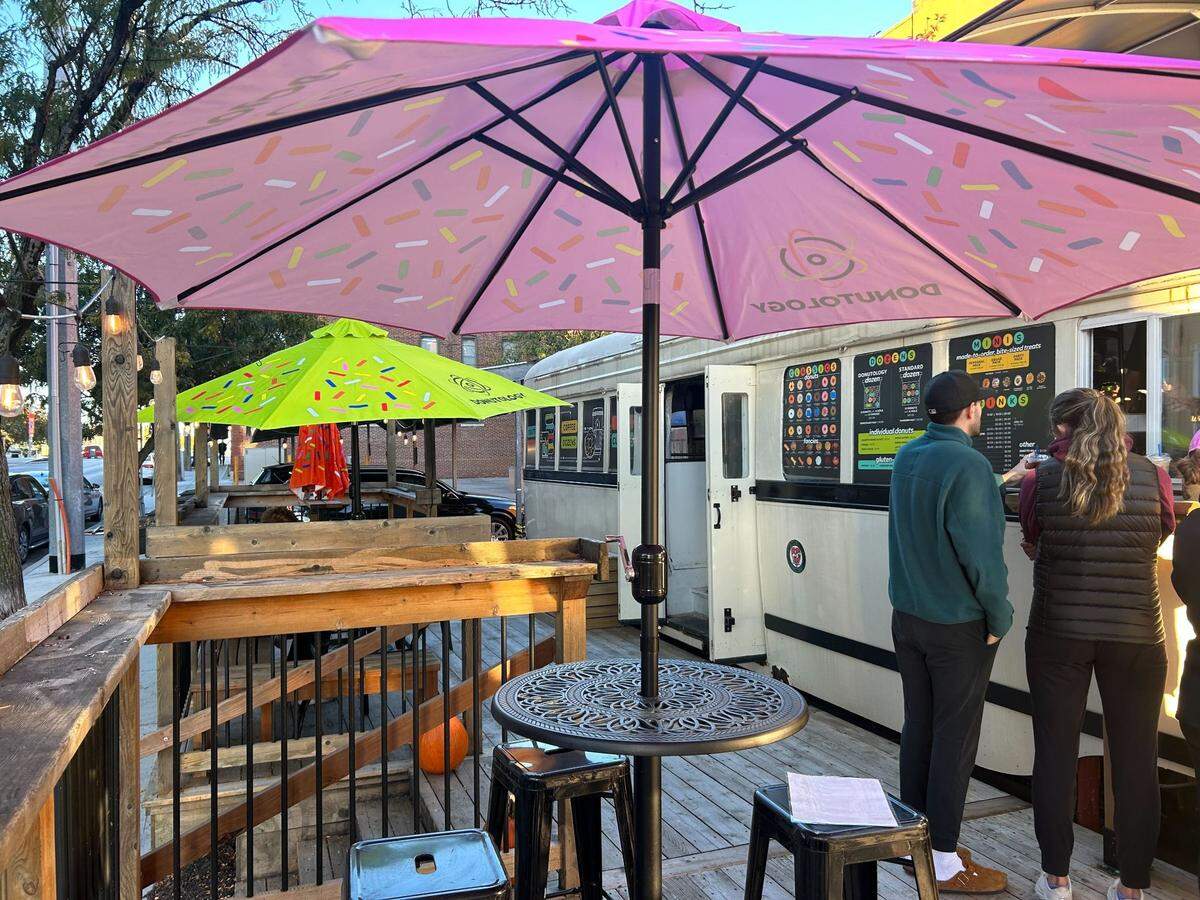 Customers can order their doughnuts at an outdoor walk-up window, or inside the streetcar, which has a few tables.