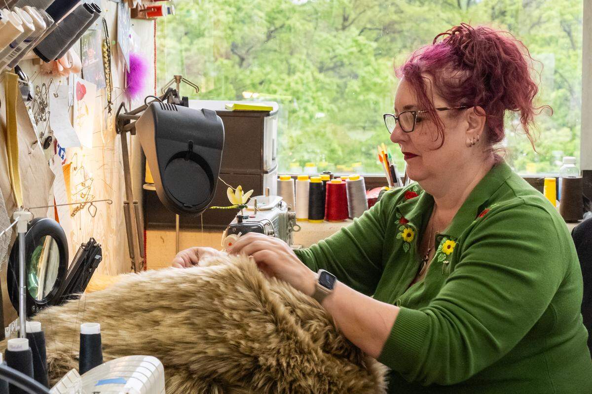 Jana Jessee works on the Cowardly Lion costume at the Spencer Theatre, in preparation for Kansas City Repertory  Teater’s rendition of “The Wizard of Oz,” on Tuesday, April 28, 2026.