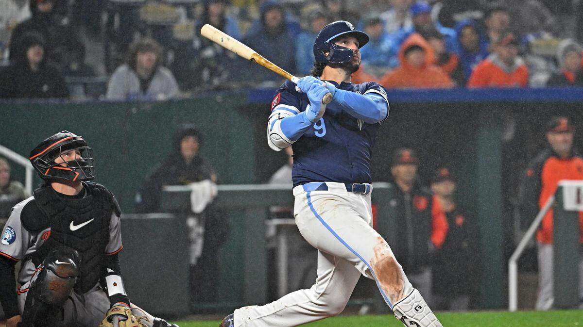 Kansas City Royals first baseman Vinnie Pasquantino (9) drives in three runs with a single in the eighth inning against the Baltimore Orioles at Kauffman Stadium. 