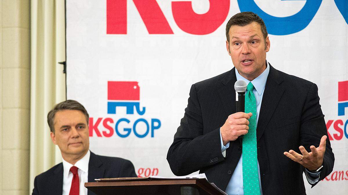 Kansas Gov. Jeff Colyer, left, and Secretary of State Kris Kobach