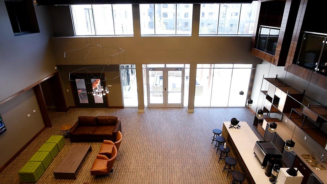 The west building of the Union Berkley Riverfront development, which opens Friday, May 18, features a lounge with a coffee bar. Other amenities include a bike lounge with a beer tap, a shower for dogs, a gym and a saltwater pool in the courtyard.