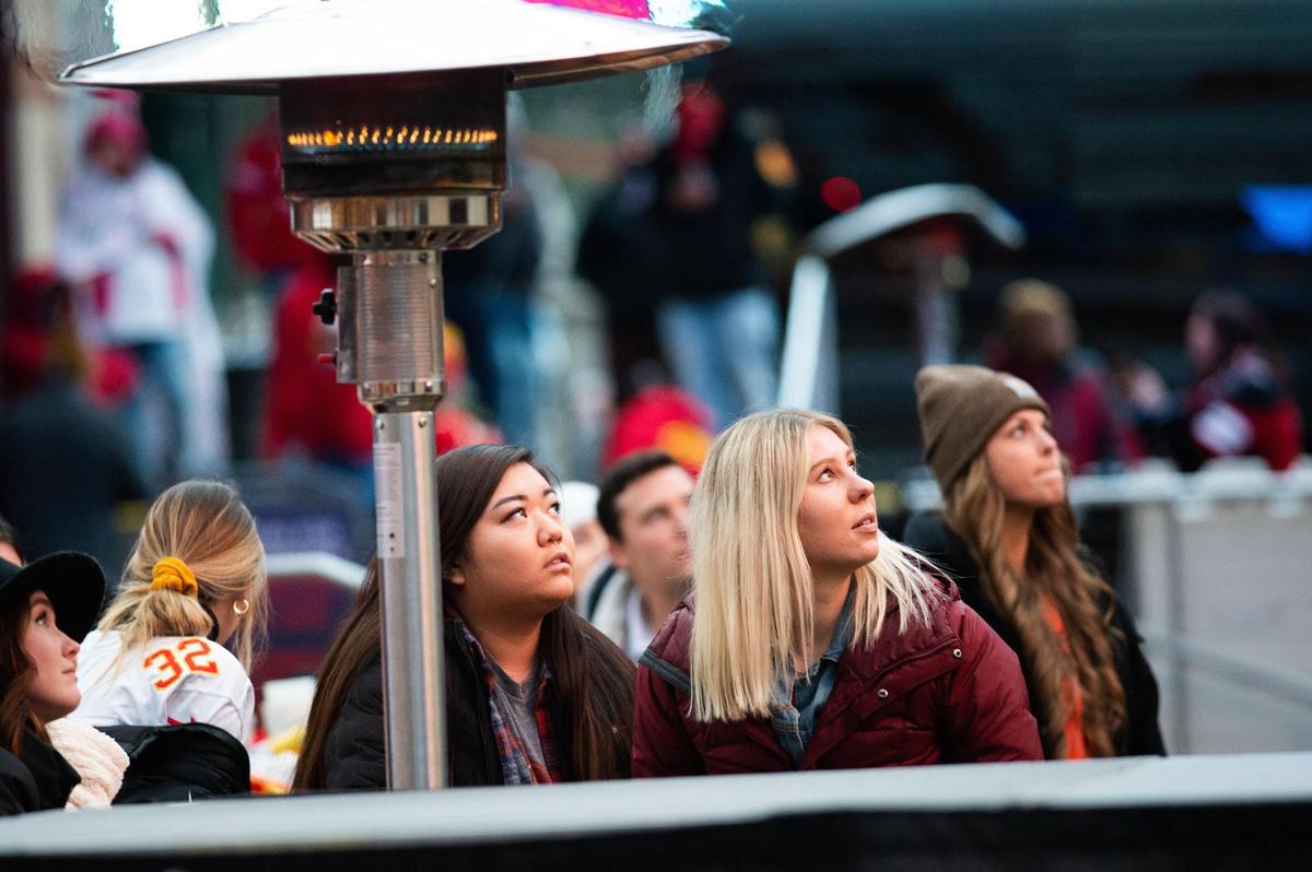 Chiefs fans watch the fourth quarter of the playoff game against the Browns nervously at KC Live! Sunday, Jan. 17, 2021.