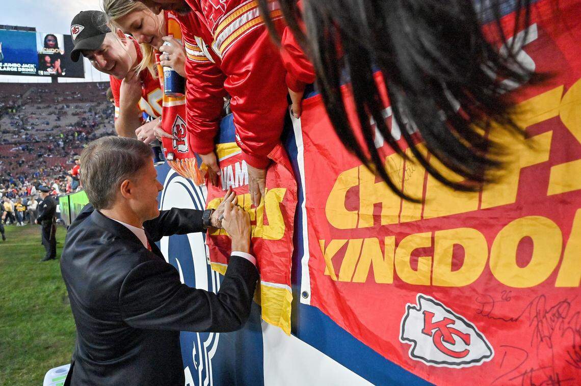 Kansas City Chiefs owner Clark Hunt autographs a Vamos Chiefs flag before Monday’s football game against the Los Angeles Rams on November 19, 2018 at the LA Memorial Coliseum in Los Angeles, Cal.