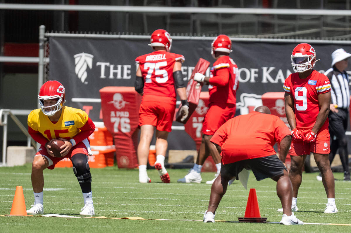 Kansas City Chiefs quarterback Patrick Mahomes and running back Kenneth Walker participate in a drill during Chiefs Minicamp on Tuesday, June 9, 2026, in Kansas City.