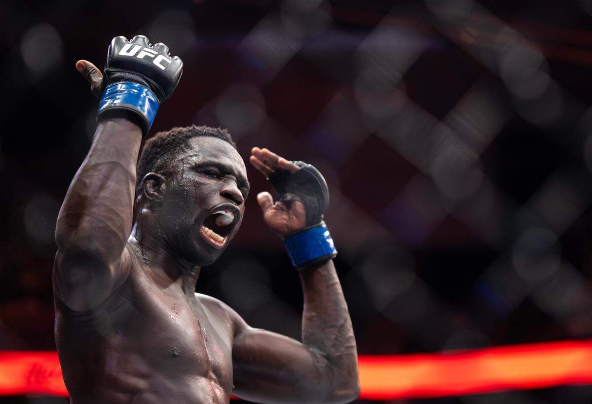 UFC featherweight David Onama urges the crowd on at the T-Mobile Center in Kansas City during his fight at UFC Fight Night: Machado Garry vs. Prates on Saturday night.