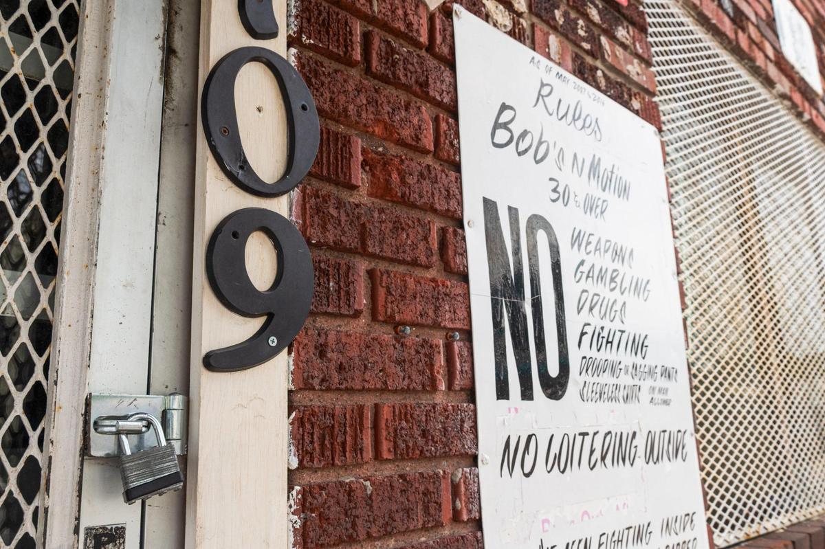 A padlock secures the entrance to Bob’s N Motion on Thursday, July 27, 2023, in Kansas City.