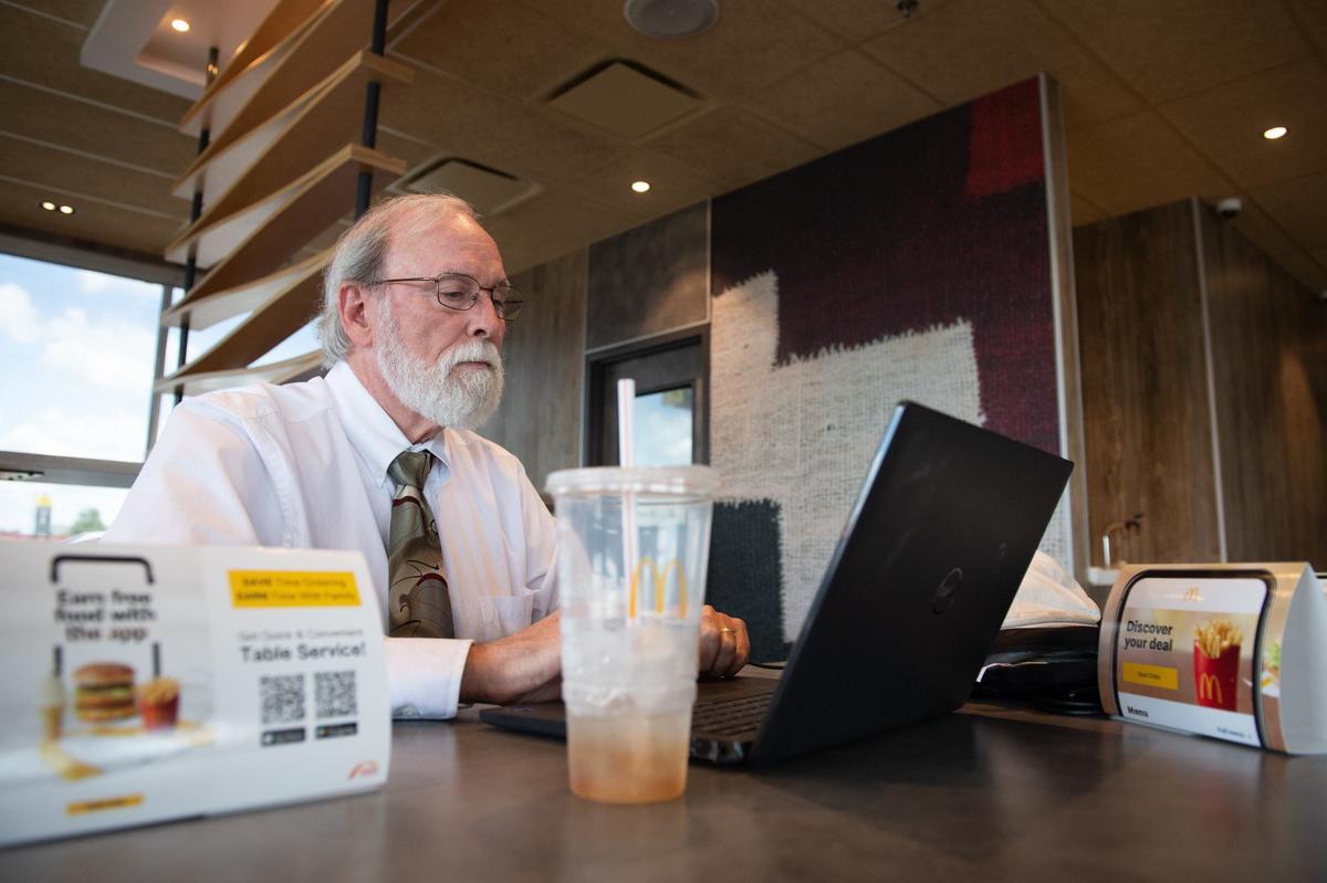 Attorney Sean O’Brien, a member of Sandra “Sandy” Hemme’s legal team, works on Thursday, July 18, 2024, from a fast food restaurant in Chillicothe, Missouri, as Hemme remains in prison despite a release order from Livingston County Circuit Court Judge Ryan Horsman.