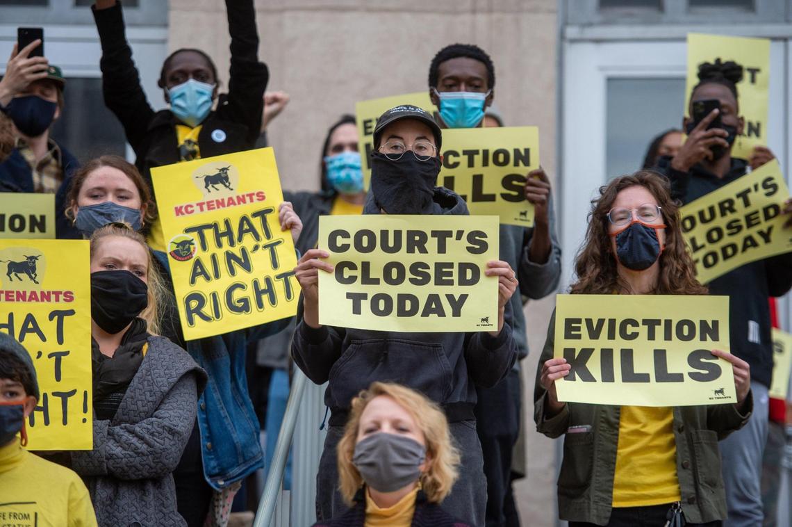 Protesters with KC Tenants came armed with signs outside the Jackson County Courthouse in downtown Kansas City on Thursday.