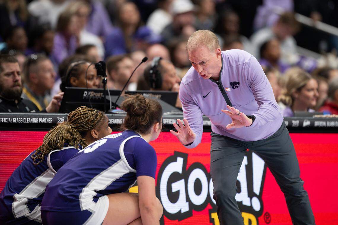 Kansas State Wildcats coach Jeff Mittie instructs guards Jordan Speiser (23) and Aniya' Foy (5) before subbing them in against TCU during the Big 12 Women’s Basketball Tournament semifinals at Kansas City’s T-Mobile Center on Saturday, March 7, 2026.