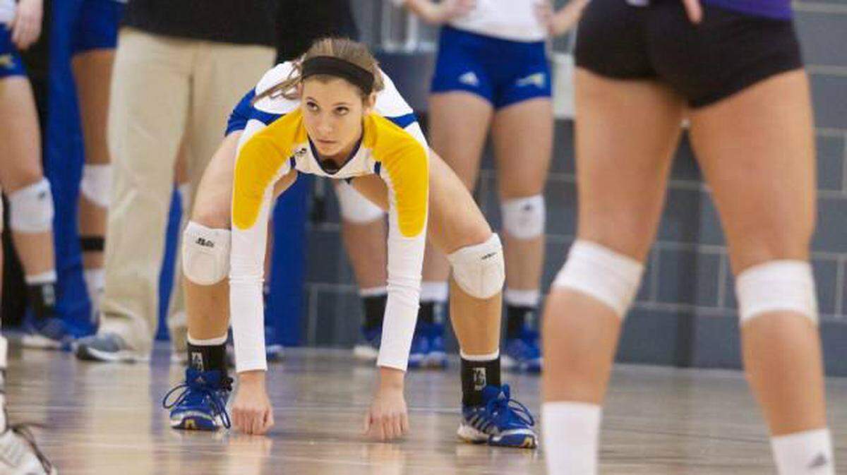 Intense? You could’ve certainly said that about Lindsay Zych as a player at Bishop Miege and then at UMKC (pictured here) ... and now the same has proven true through a young coaching career at Lansing High and her prep alma mater.
