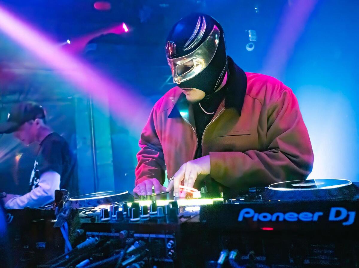 In addition to his work as a DJ, FK Menace also works as a clothing designer for the local KC brand, MADE MOBB; a painter; event coordinator and arts advocate.