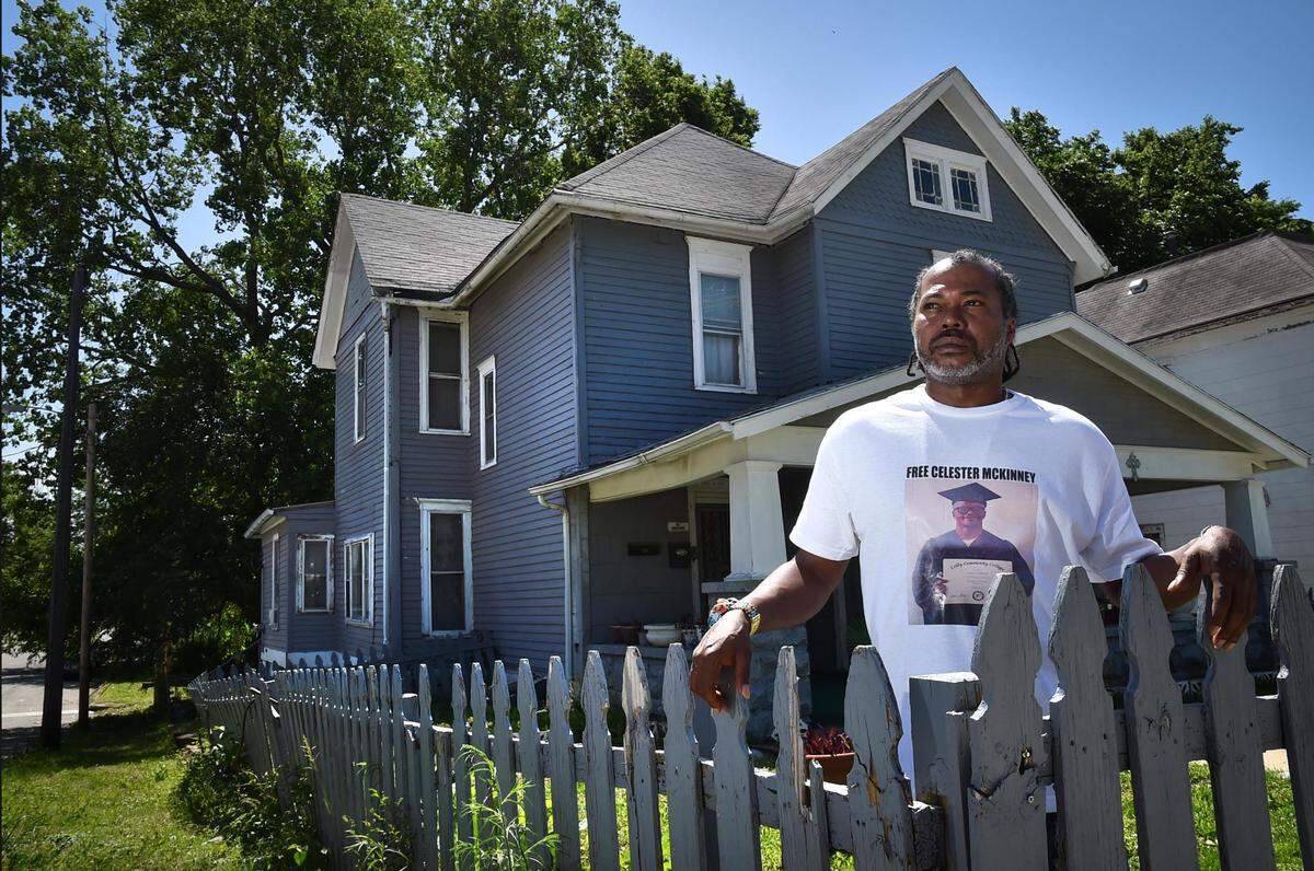 Dwayne McKinney, brother of Celester McKinney and cousin to Brian Betts, stood outside a family home near North 5th Street and Greeley Avenue in Kansas City, Kansas. McKinney traveled to Kansas City from his home in Georgia earlier this year to attend a rally to call for the release of Betts and Celester McKinney, who family members say were wrongly convicted in a shooting down the street. Dwayne was also charged in the murder, but found not guilty.