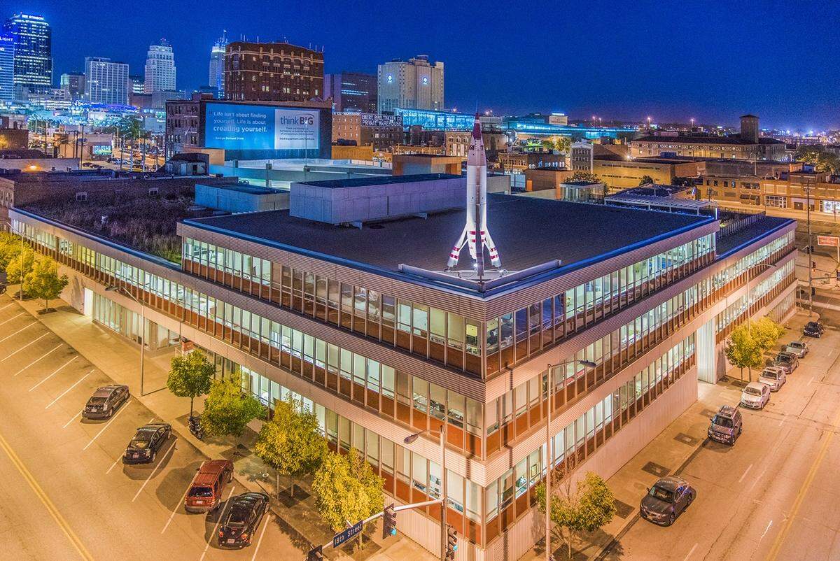 The model rocket that is on top of the building at 1785 Baltimore Ave. is a replica of the TWA Moonliner II.
