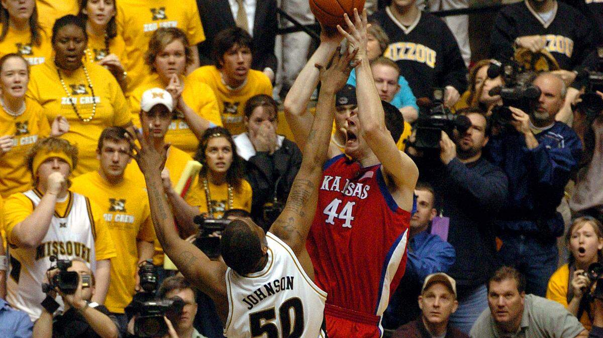 The final shot in Hearnes Center history went to KU freshman David Padgett (right), who sank an 8-footer over Arthur Johnson that gave Kansas an 84-82 victory Sunday.