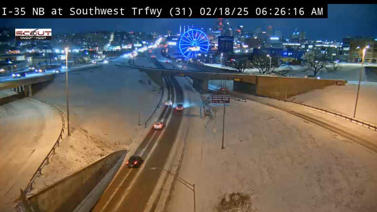 A KC Scout camera shows snow starting to cover Interstate 35 in Kansas City at Southwest Trafficway on Feb. 18, 2025. The metro area could get anywhere from 3 to 5 inches of snow Tuesday, according to the National Weather Service in Kansas City.