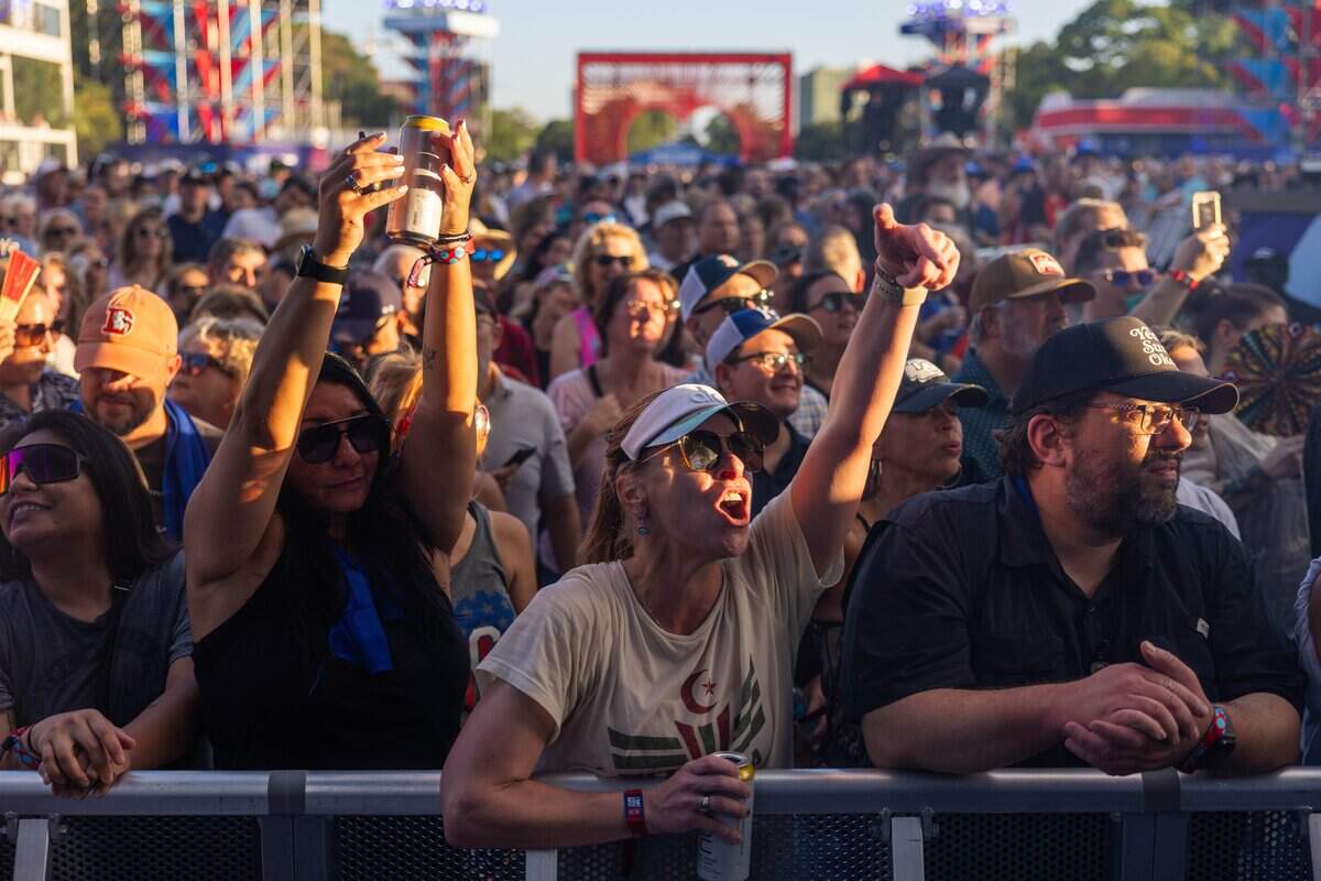 Fans sing along and throw their arms in the air for Sheryl Crow during their FIFA Fan Fest concert at Fan Fest on Friday, July 10, 2026.
