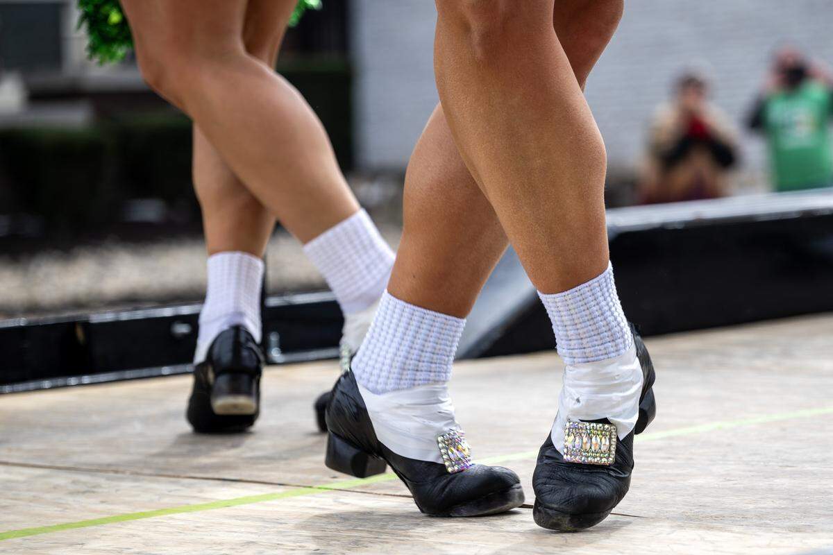 Irish step dancers perform during the St. Patrick's Day parade along Broadway Boulevard on Tuesday, March 17, 2026, in Kansas City.