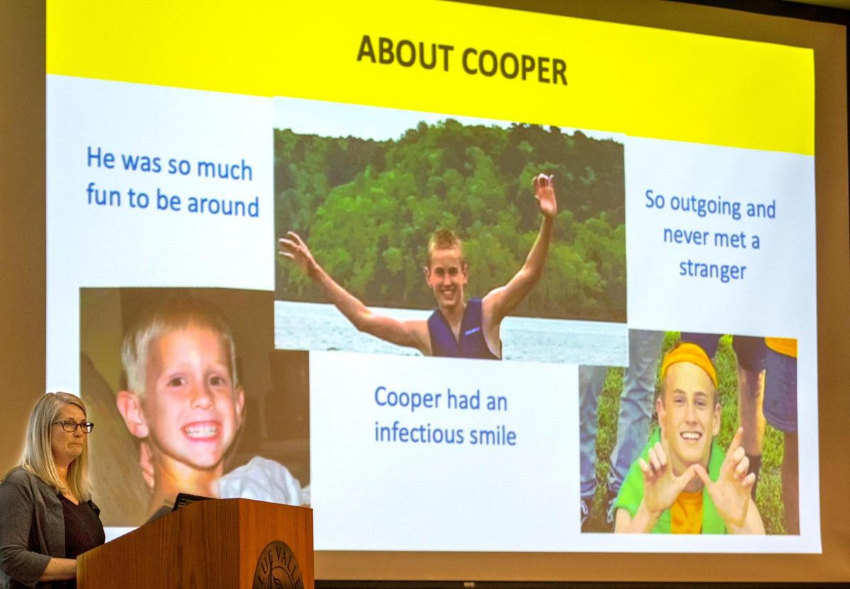 Libby Davis spoke to parents at a recent forum on substance abuse at the Blue Valley school district’s Hilltop Learning Center in Overland Park. She showed photos of her son Cooper, who died in August from a fentanyl overdose.