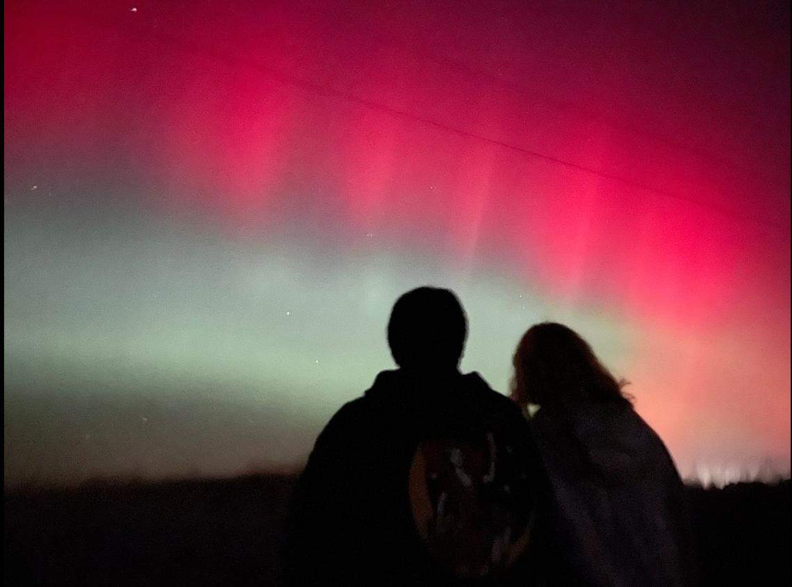 David Sutherland captured this photo on his phone of the northern lights over his family, one mile north of Atchison, an hour northwest of Kansas City.