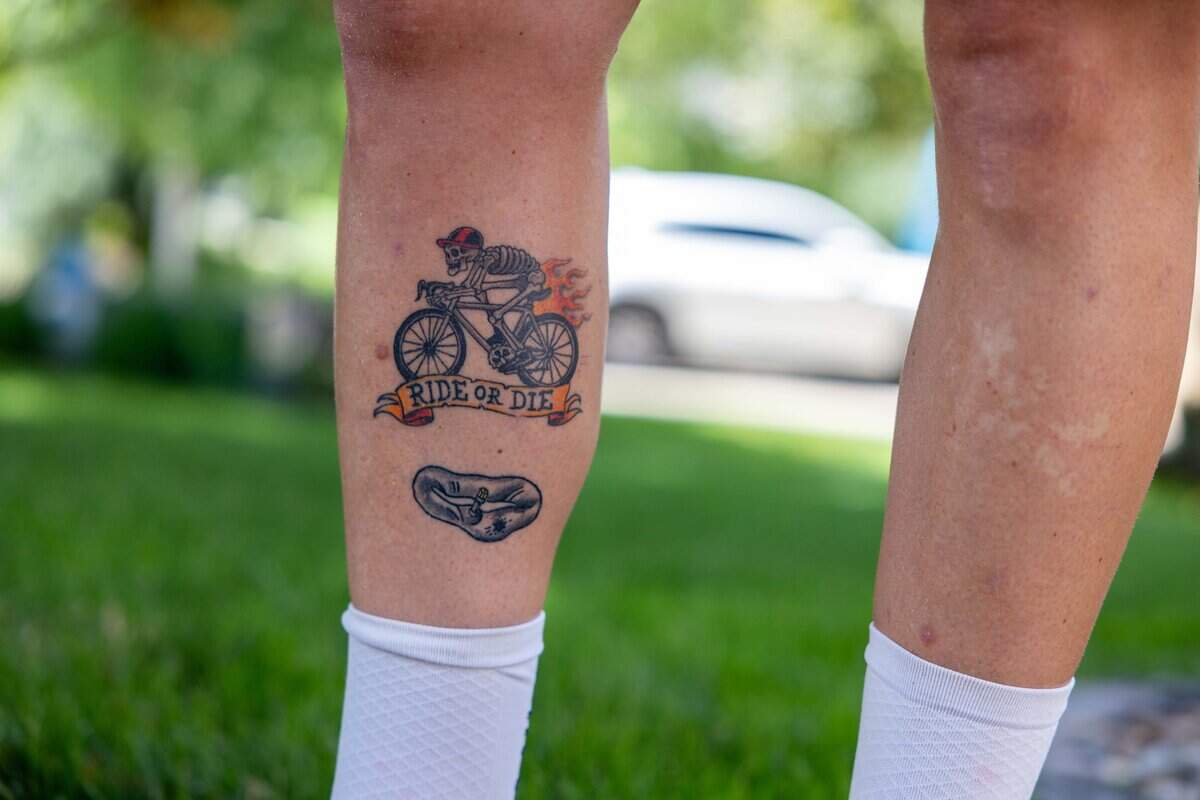 Professional darts player Jules van Dongen shows one of his tattoos outside his home on Saturday, June 13, 2026.