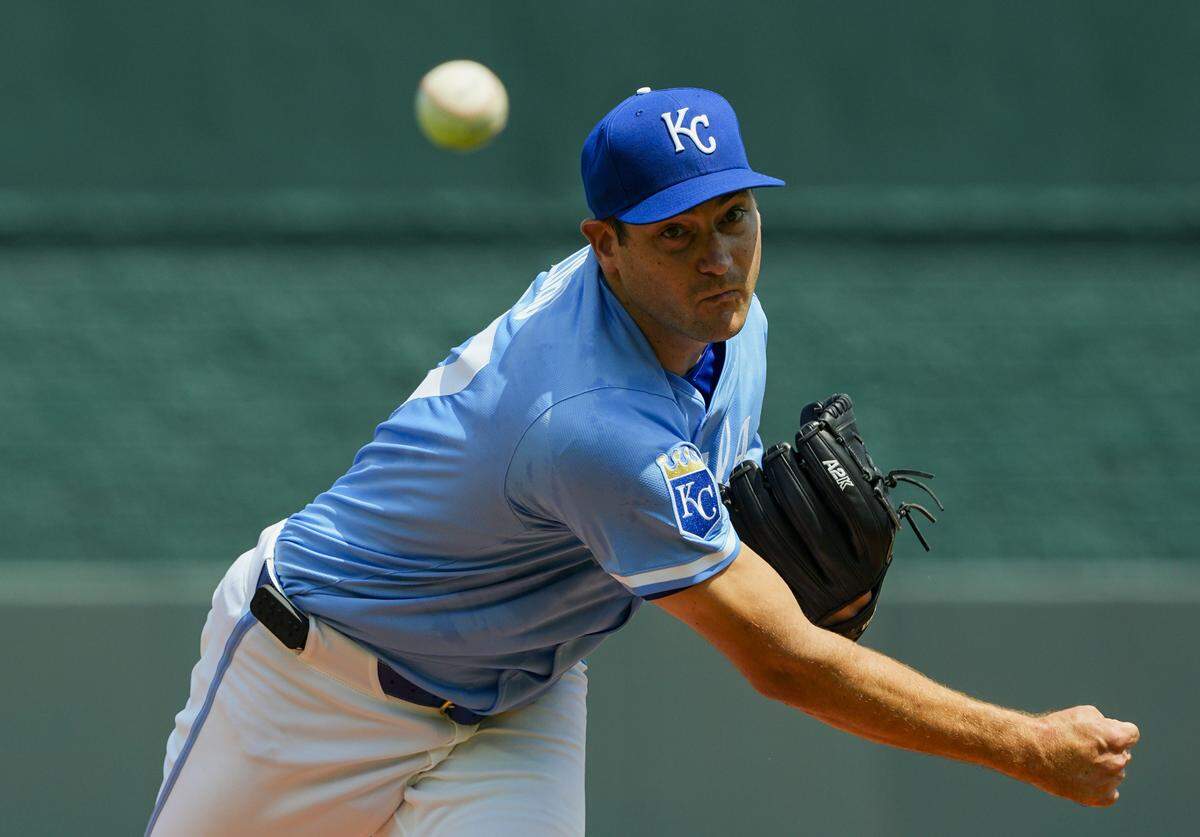 Kansas City Royals starting pitcher Seth Lugo (67) pitches during the first inning against the Washington Nationals at Kauffman Stadium on Aug. 13, 2025.