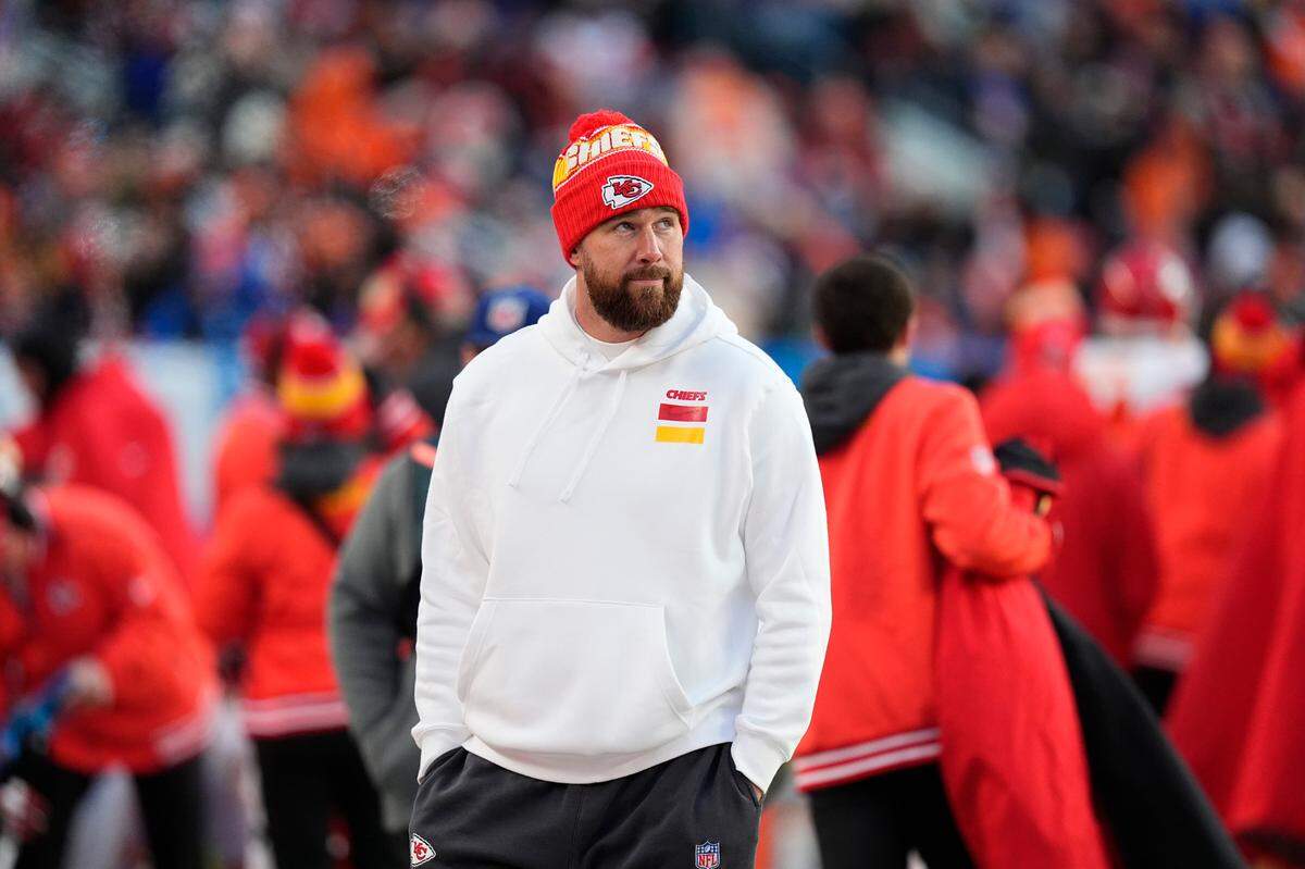 Resting ahead of the playoffs, Kansas City Chiefs tight end Travis Kelce was a spectator for his team’s NFL Week 18 game against the Broncos at Empower Field at Mile High in Denver on Sunday, Jan. 5, 2025.